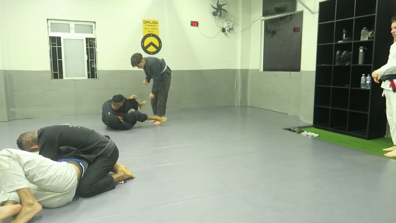 Rolling with my 4th degree black belt master (3/6)