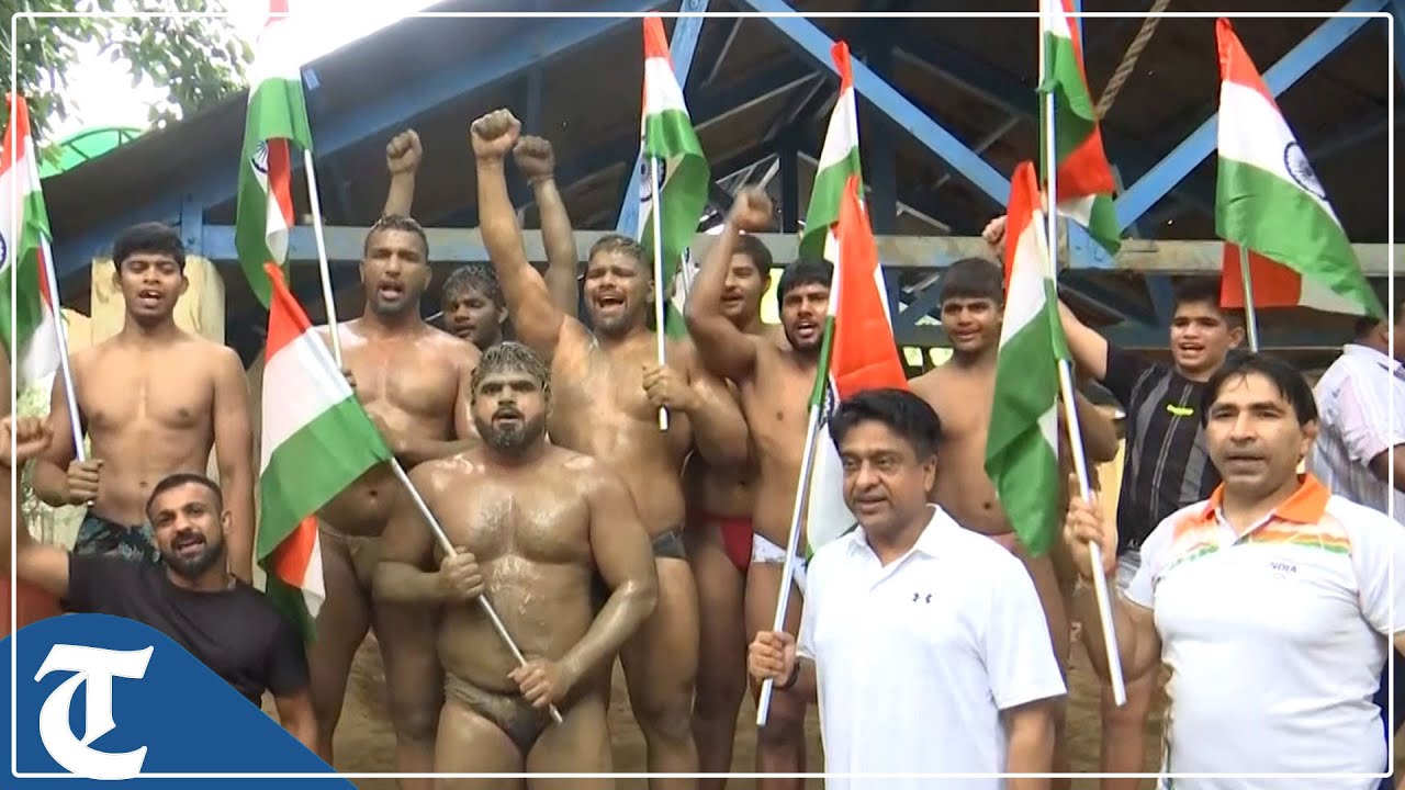 Delhi: Wrestlers hoist National Flag at Hanuman Akhada as part of ‘Har Ghar Tiranga’ campaign