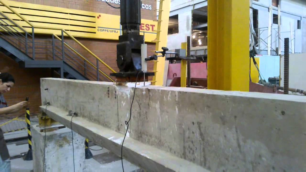 Fatigue Test of Strengthened Reinforced Concrete Beam