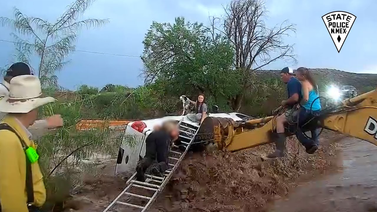 New Mexico State Police Officer saves woman, child, and dog in swift water rescue