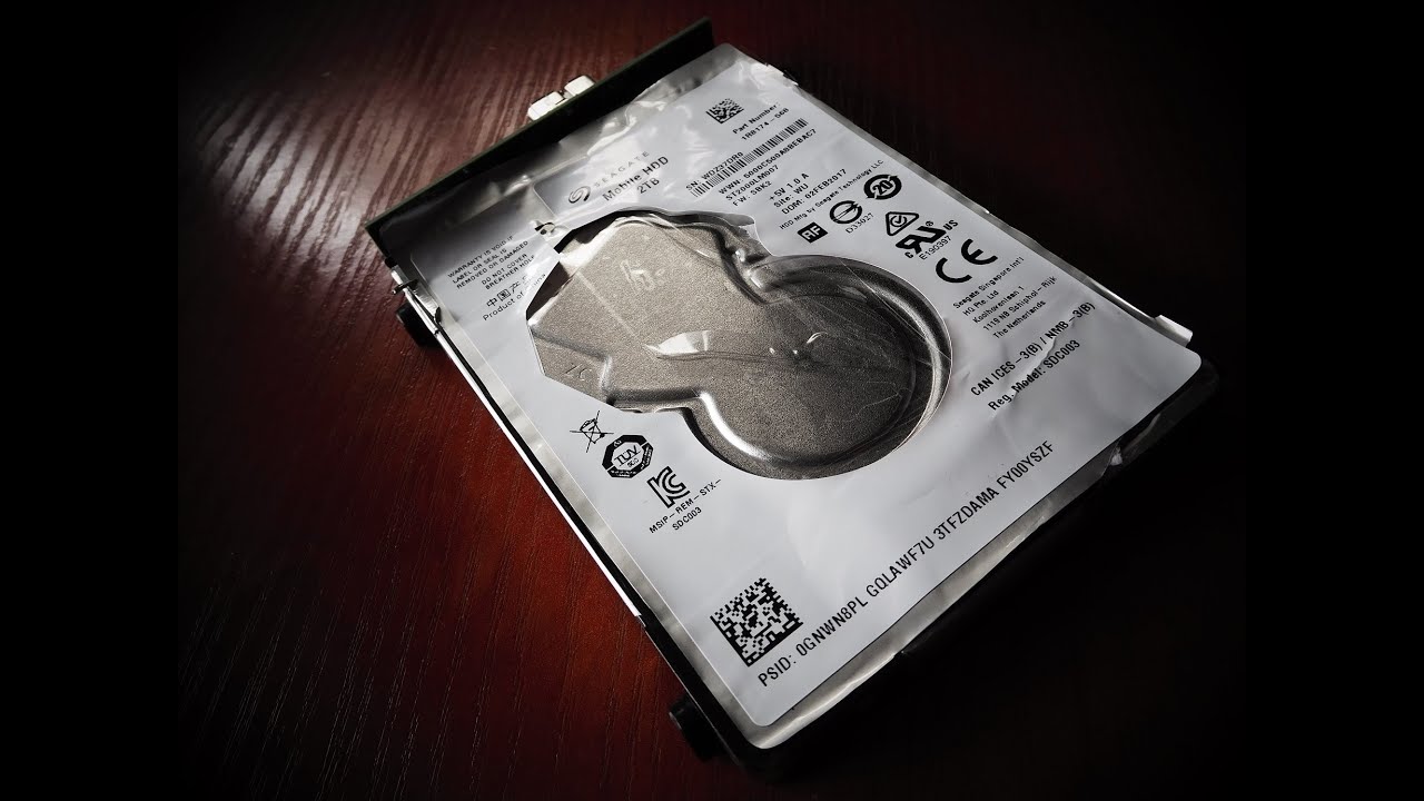 Seagate ST2000LM007 - Rosewood - odzyskanie danych z dysku - urwane głowice przyklejone do talerzy.