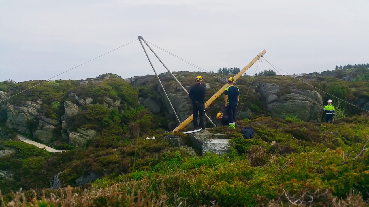 Energimontør(Lineman) norway reising av master med saks og tirfor