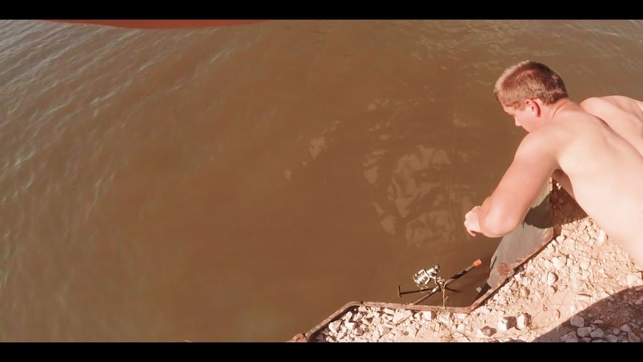 Fishing Fail and Recovery - Flathead pulled Rod and Holder off shore into water.