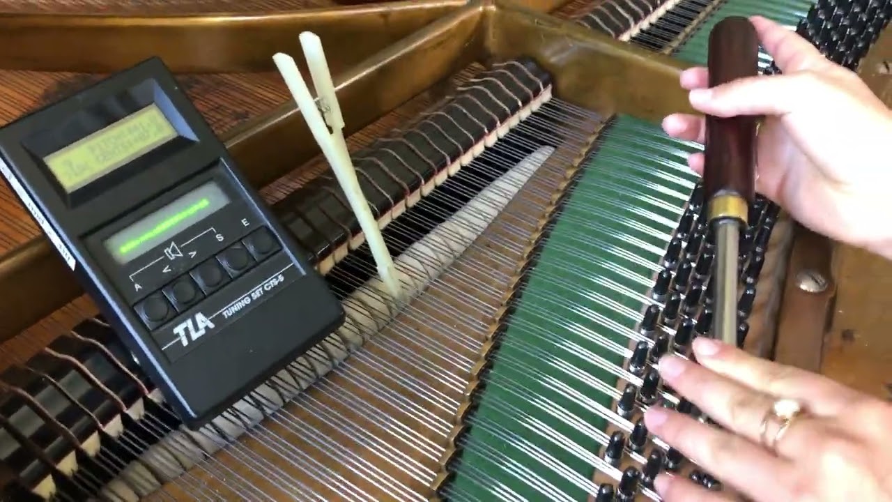 Tuning a unison in a beginning piano tuning tutorial