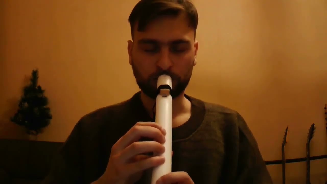 Playing a homemade Native American Flute