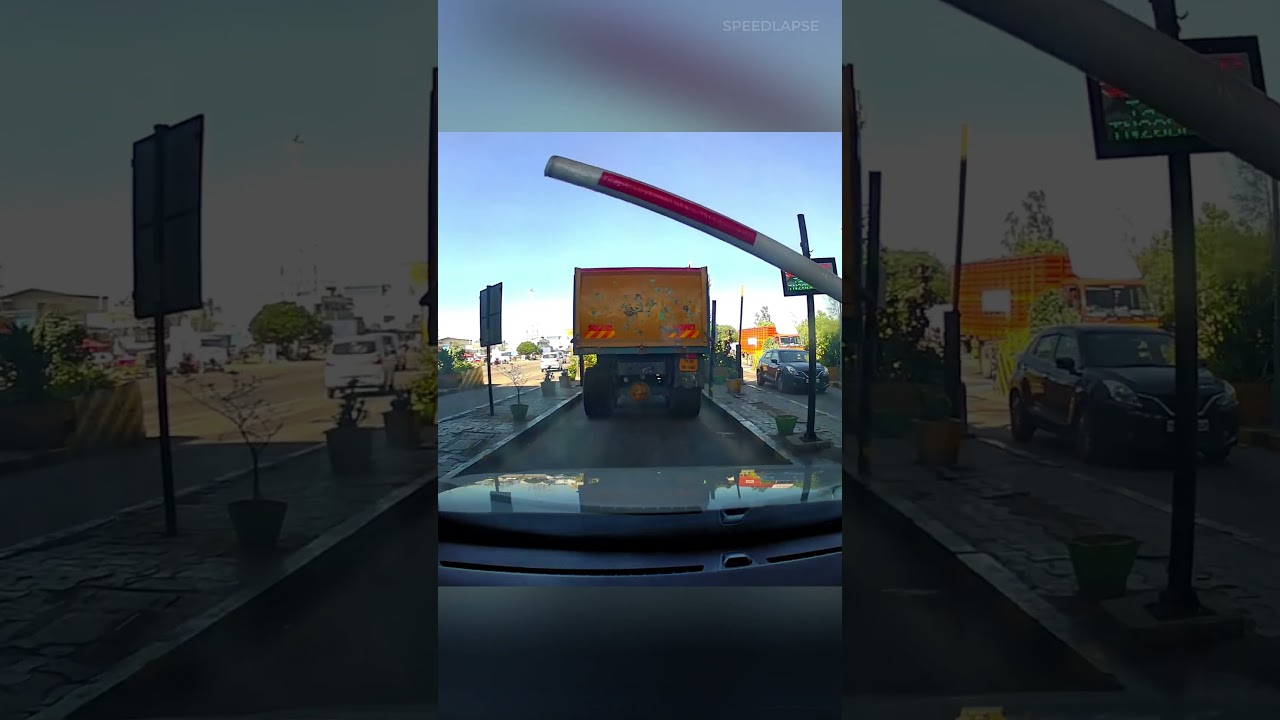 Unbelievable Dashcam Video: Car Rams into Toll Booth!