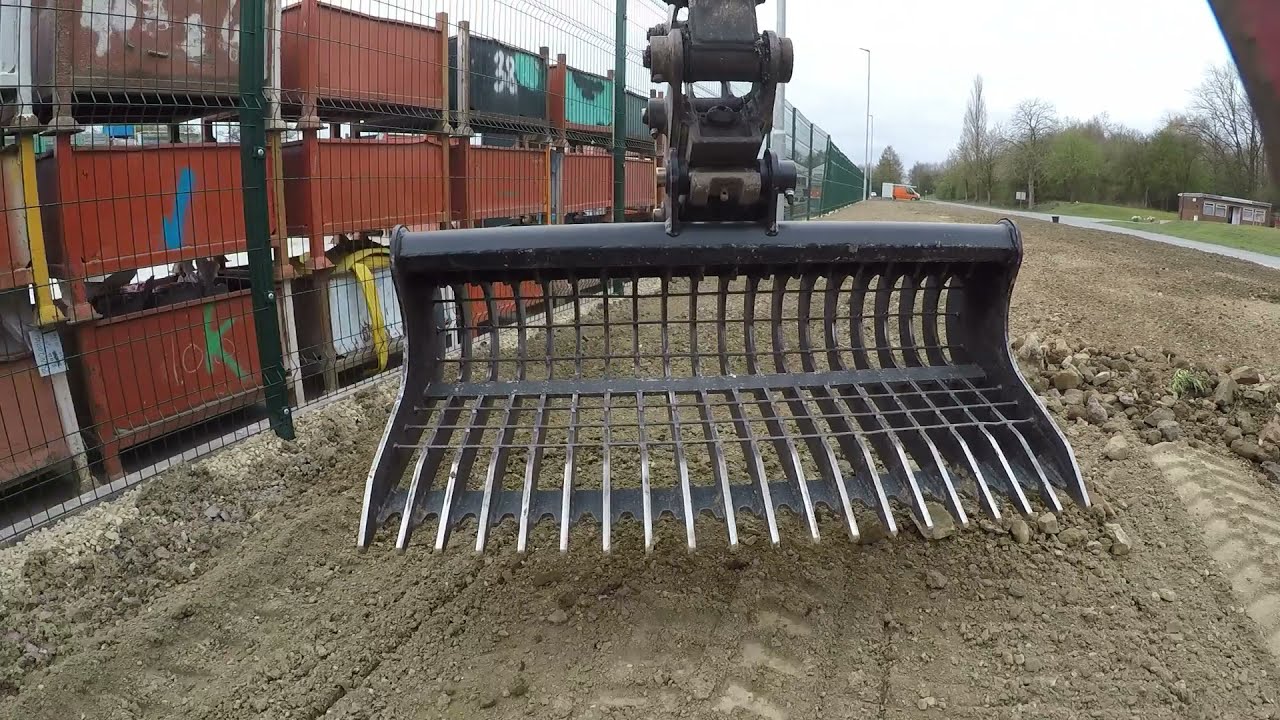 Takeuchi tb125 and landscape rake