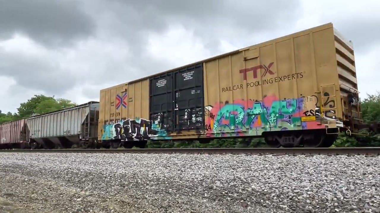 NS 8105 Interstate leads 171 westbound through Enon, OH. 2:35pm. SD40-2 3rd of 6