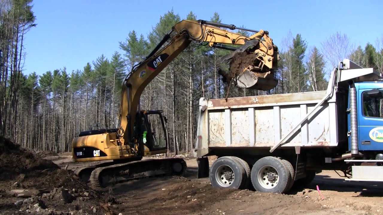 Cat 315DL Loading Dump Truck