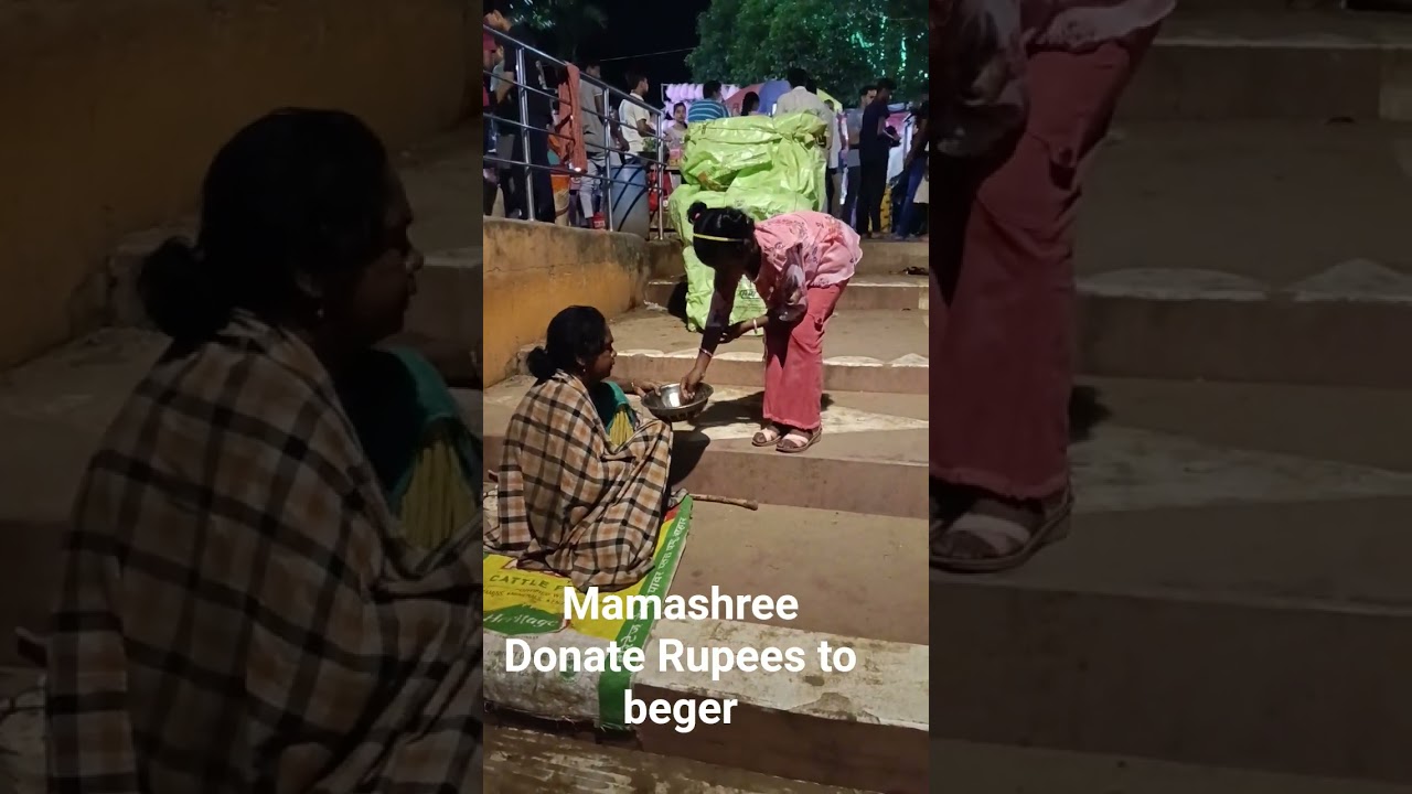 Mamashree donate rupees to beger at-Rajghat Baruni Mela