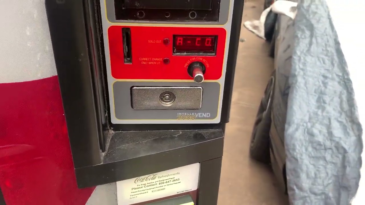 The Coca Cola Royal Vendors Vending machine at Car maintenance