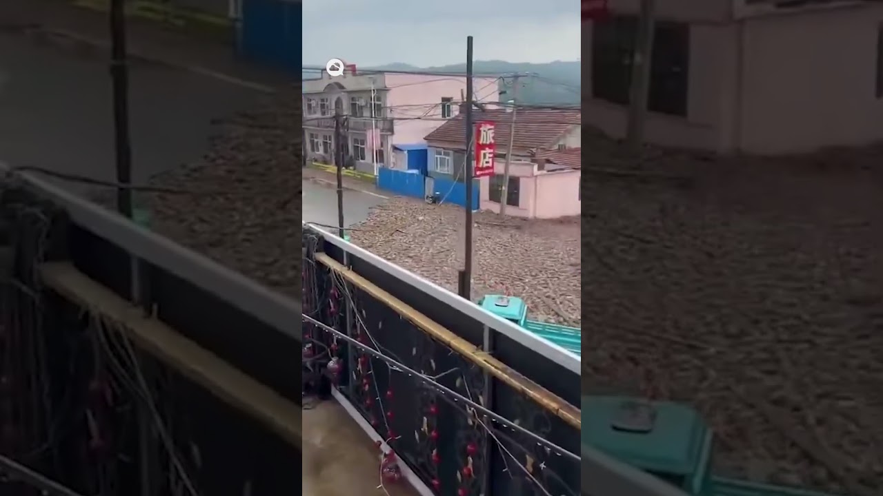 A flash flood covers the streets of Chunyang, China, in a few seconds