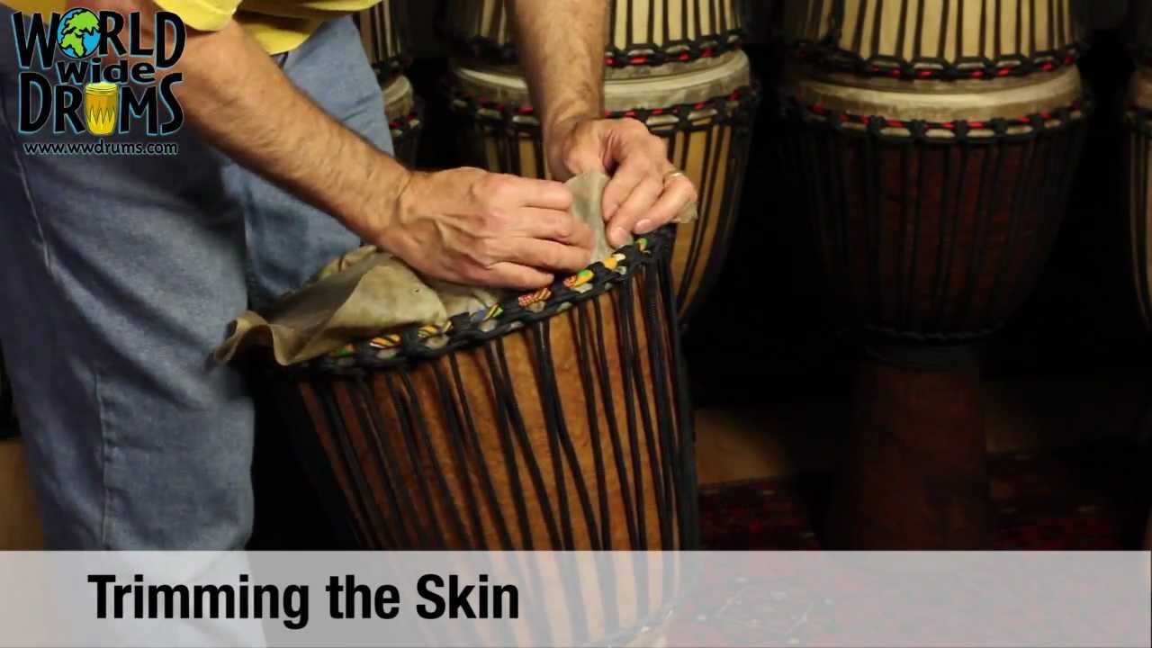 Djembe Repair & Rehead - Trimming Goat Skin on Djembe Drum