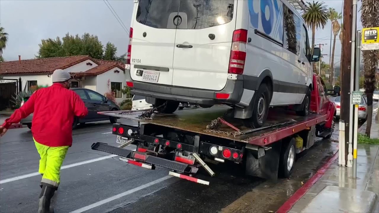 Tow truck driver offers sage advice on rainy day