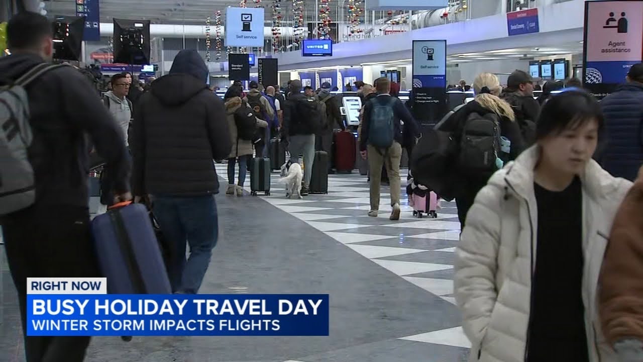 Winter storm impacting  busy holiday travel day in Chicago