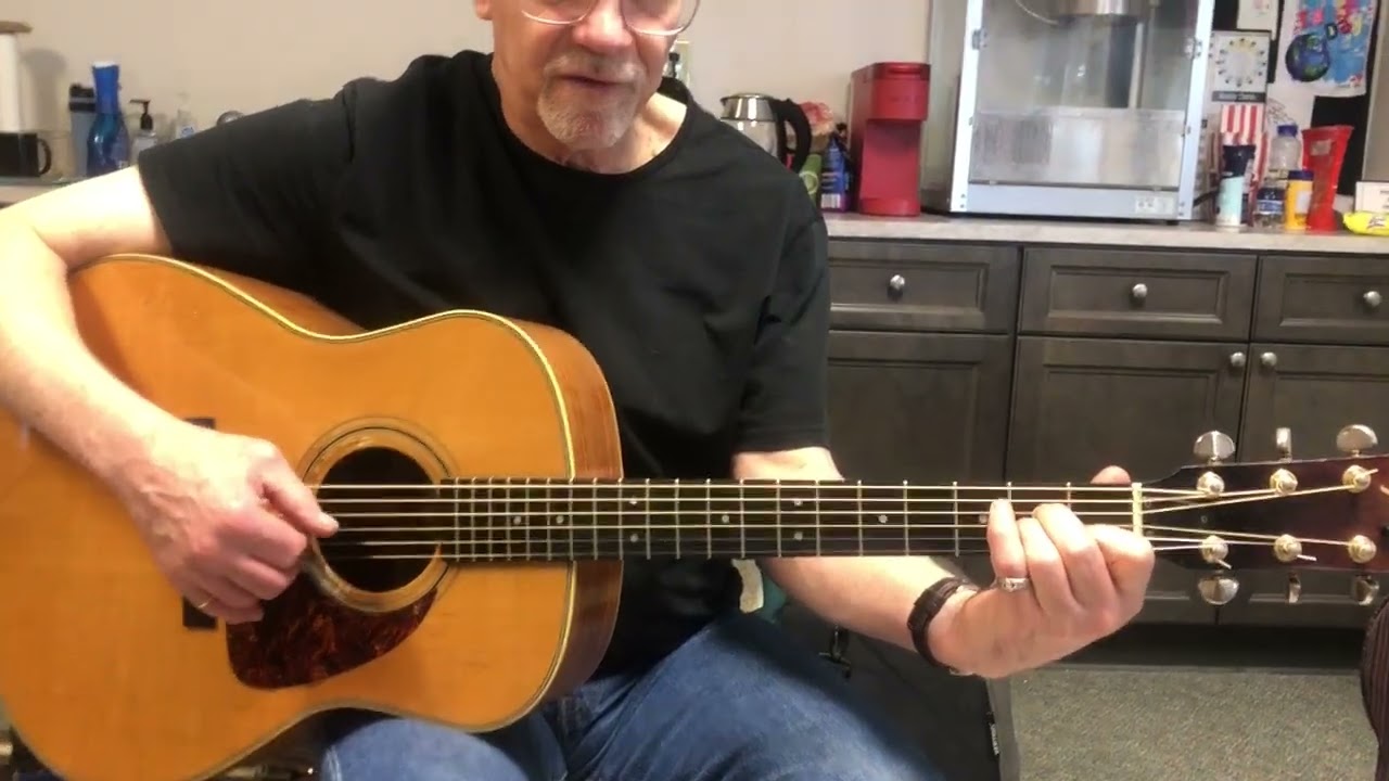 Beginning guitar lesson Am Dm Em 2 and A D E major.  Very slow.