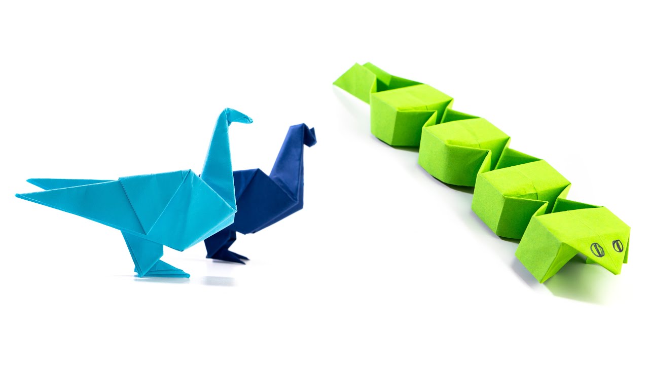 Serpiente de papel vs. pájaro de papel. Idea de origami.