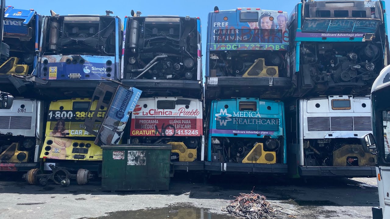 MIAMI-DADE TRANSIT AND BROWARD COUNTY TRANSIT BUSES AT THE SCRAP YARD