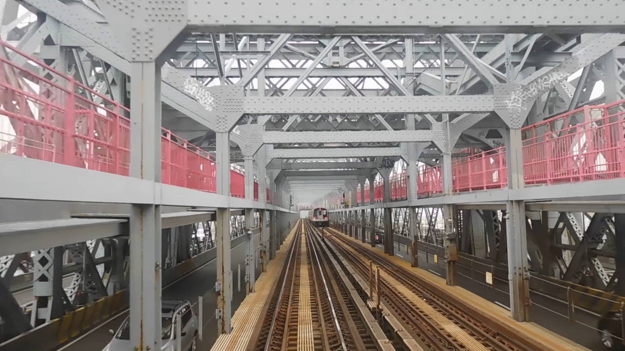 Back RFW R32 (J) train crossing the Williamsburg Bridge Marcy Avenue to Essex Street (CC)