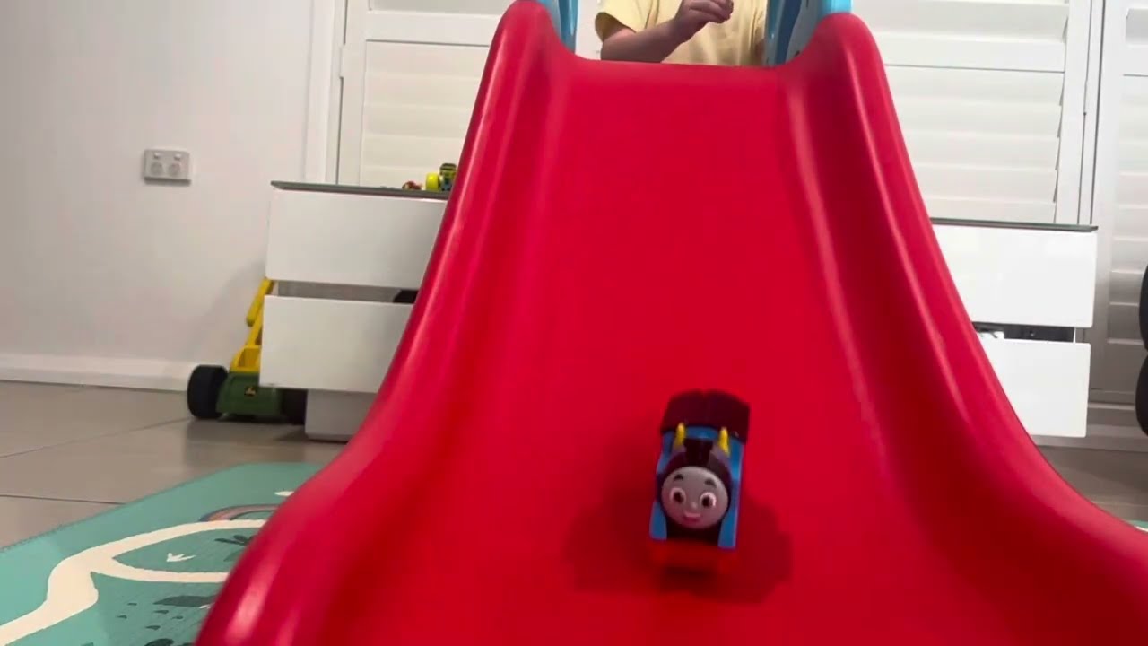 Toy Cars and Hot Wheels Cars Zoom Down a Red Slide 