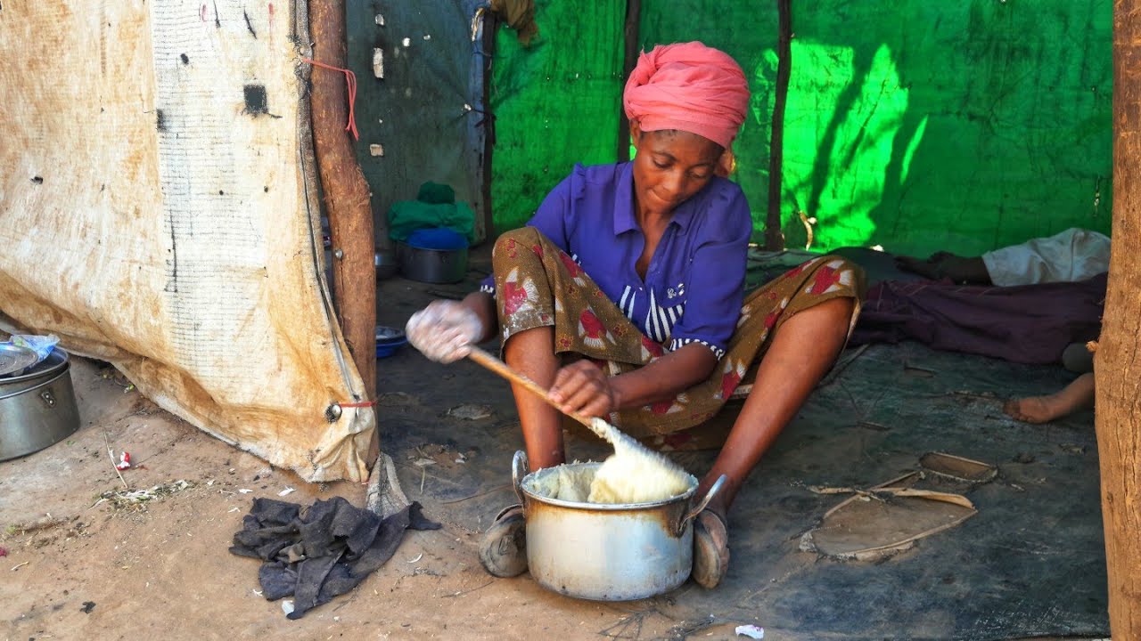 Cooking  Traditional   Burundian 🇧🇮 Food. sweet potatoes leaves  with wheat flour/ village life