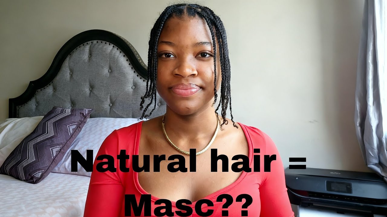 Short natural hair isn't masculine. You aren't used to seeing women with It.