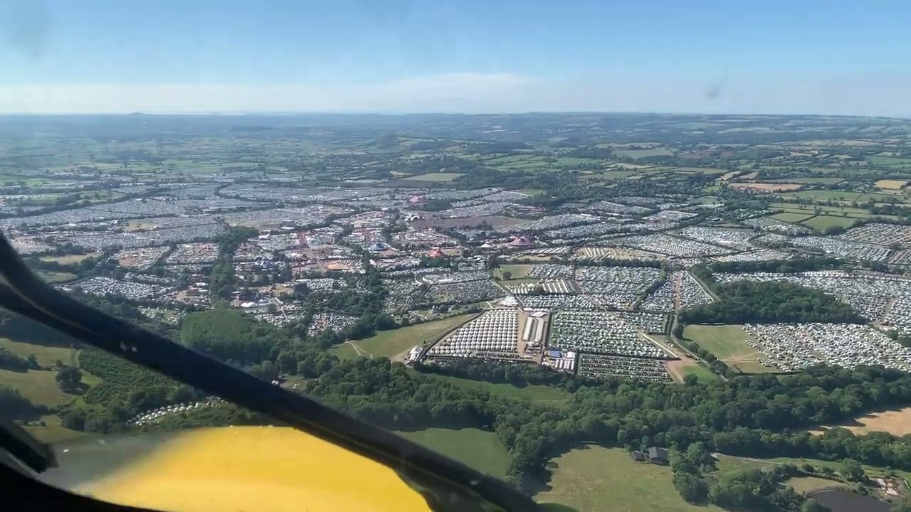 Aerial view approaching Glastonbury Festival 2023