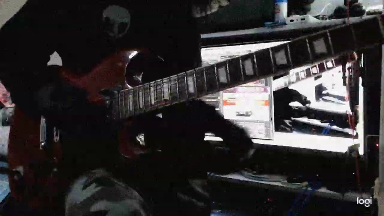 Mouggier tries to play the guitar 06