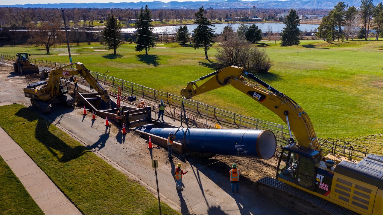 Installing big water pipes in northwest Denver.