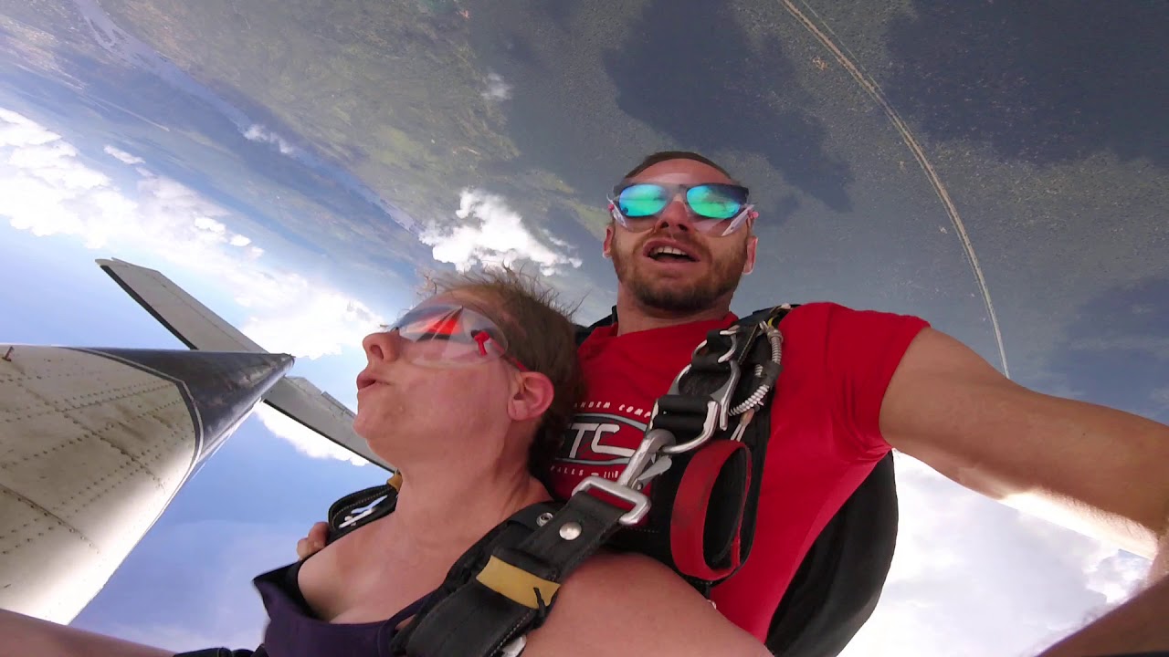 Survival under the plane. We stuck on plane's chassis during tandem skydive | The Skydiving Channel