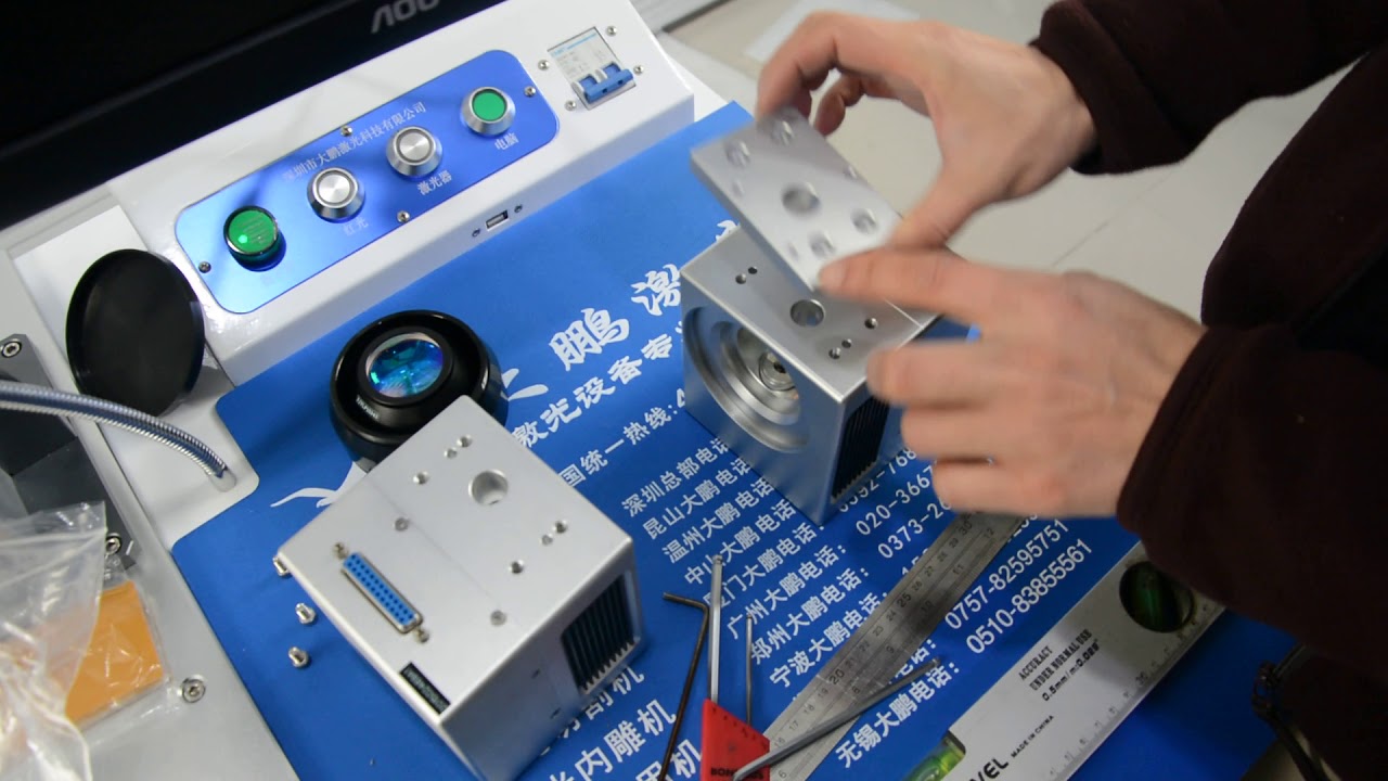 how to replace the scan head for dapeng laser marking machine