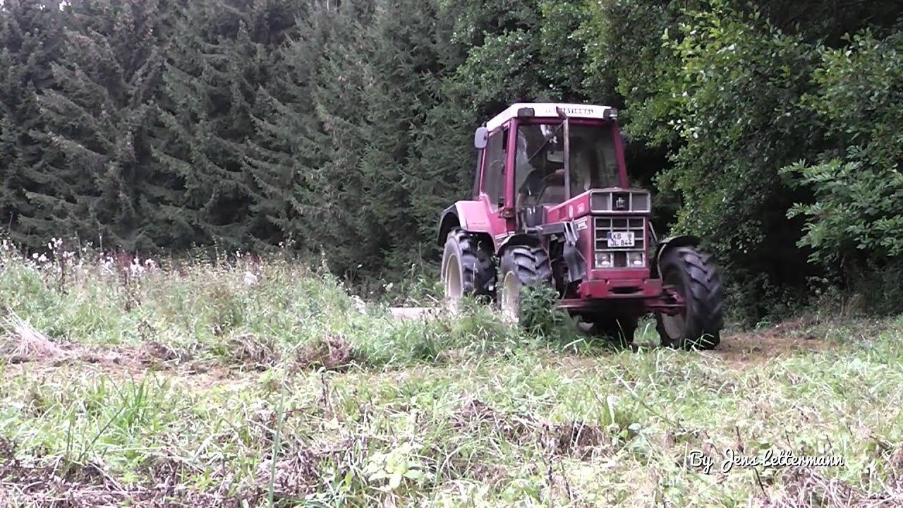 IHC 844 XL mit Scharnagel Weidemeister Mulcher