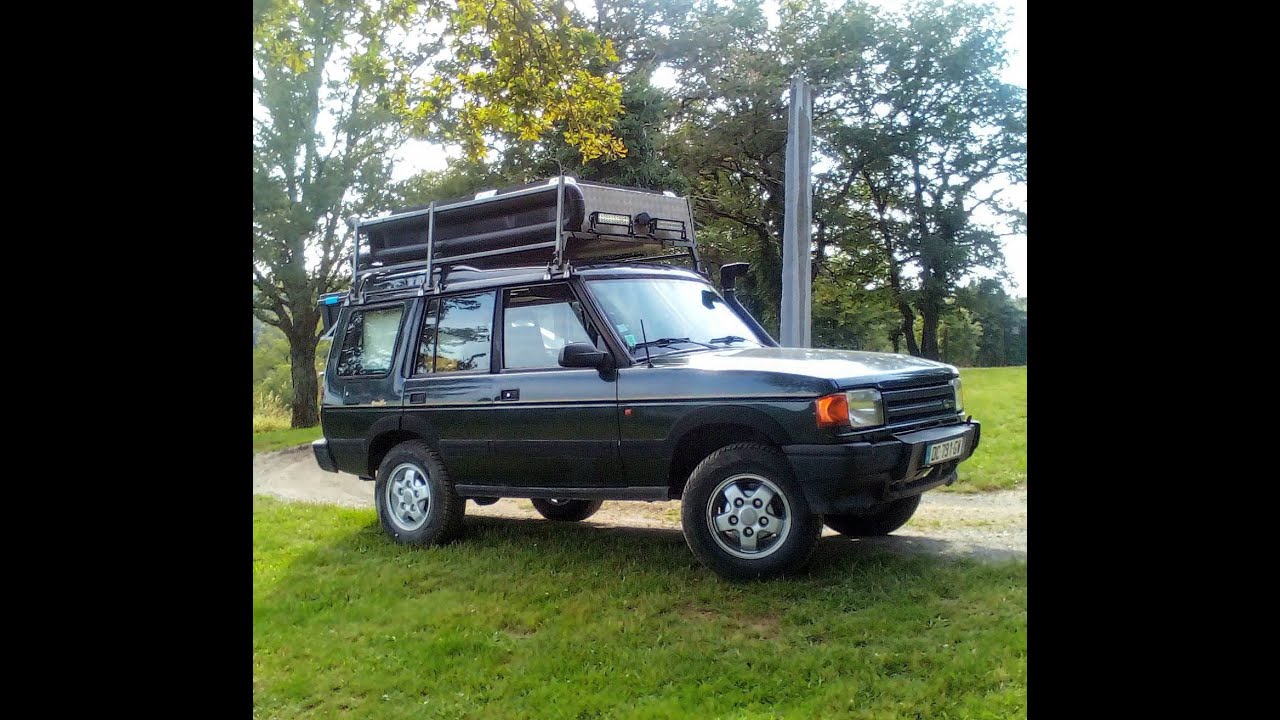Le Discovery 300 TDI, un choix expliqué avec couchage 2 personnes à l'intérieur.