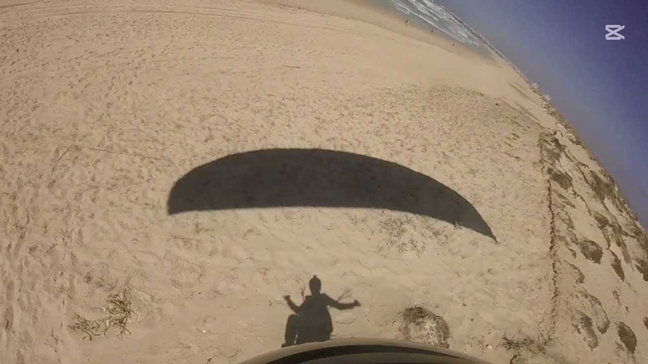 low level soaring little dunes of Peniche Portugal Beach