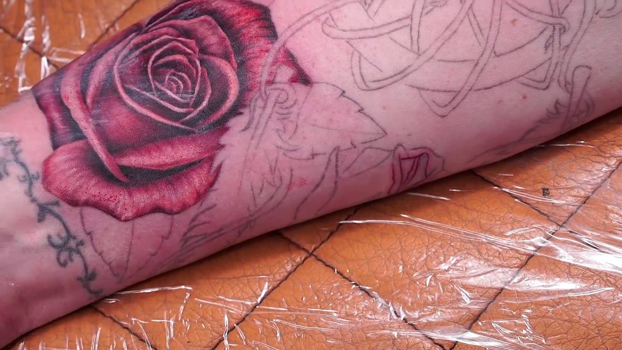 Realistic rose tattoo