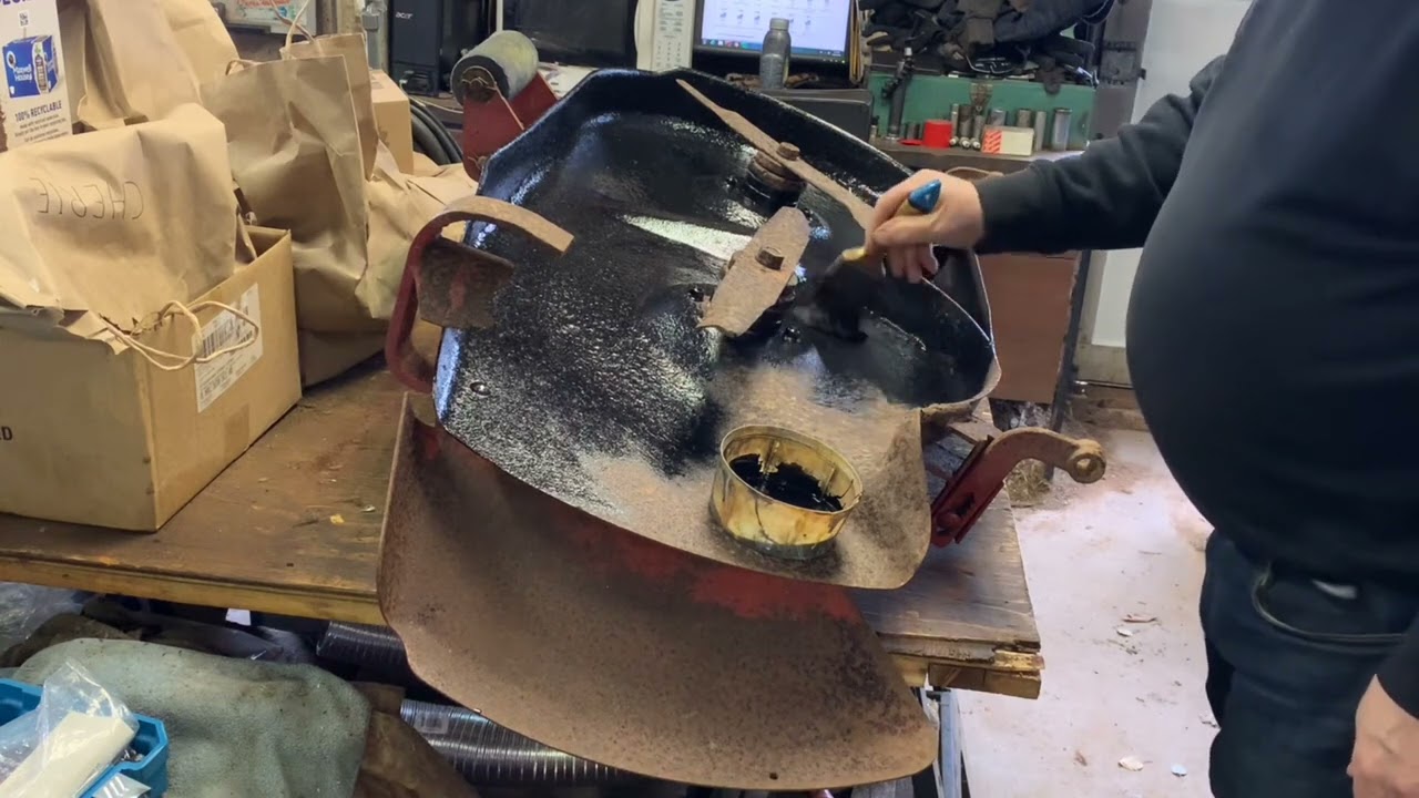 MF8 mowing deck finishing. Por15 put on. Roller is older and ready to install. And it’s snowing out.