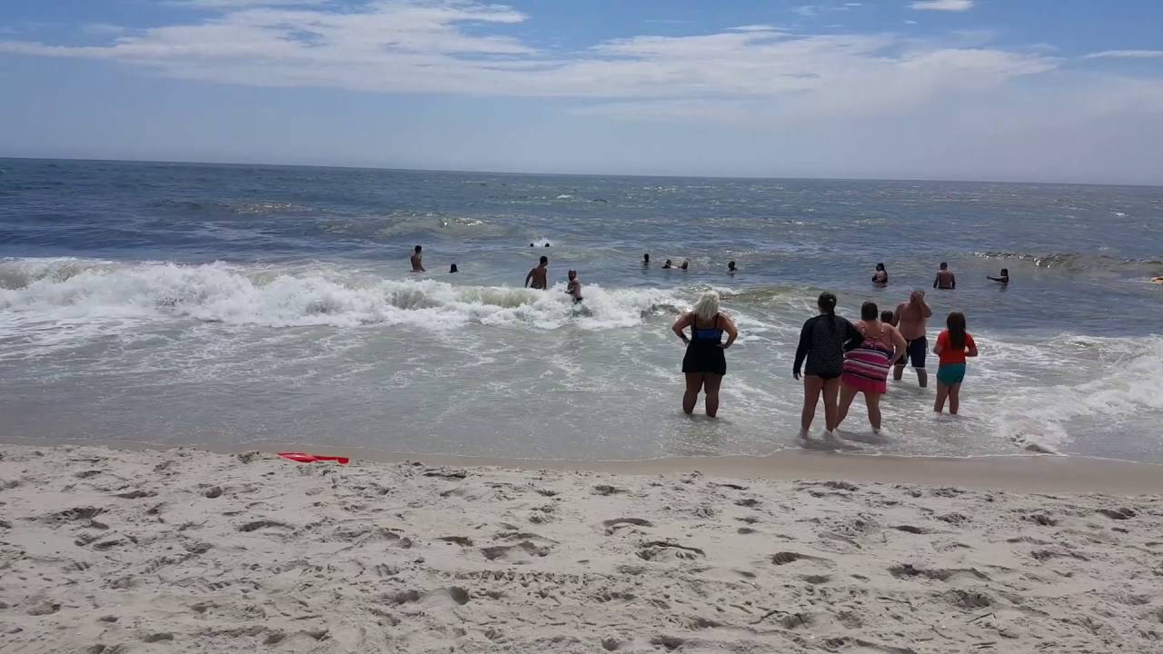 Long Island, NY: Robert Moses Beach Lifeguards Rescue Swimmers Caught in Strong Ocean Currents