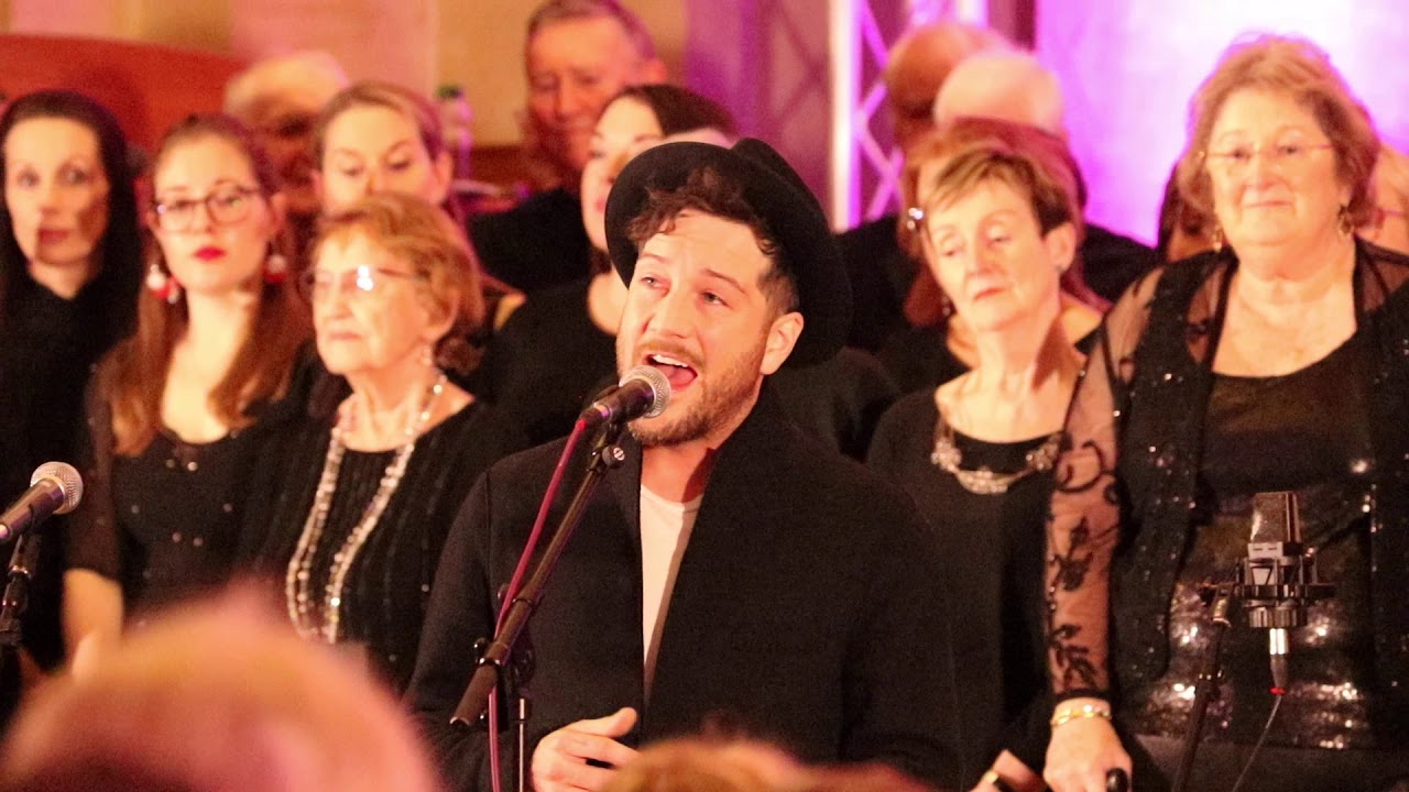 Matt Cardle singing at Choir on the Green's Christmas concert 2019