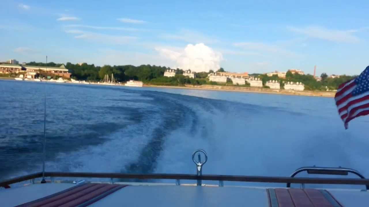 Four Winns Liberator Racing a Baja  On the Hudson River