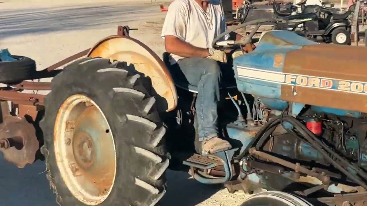 Ford 2000 with front blade and Disc
