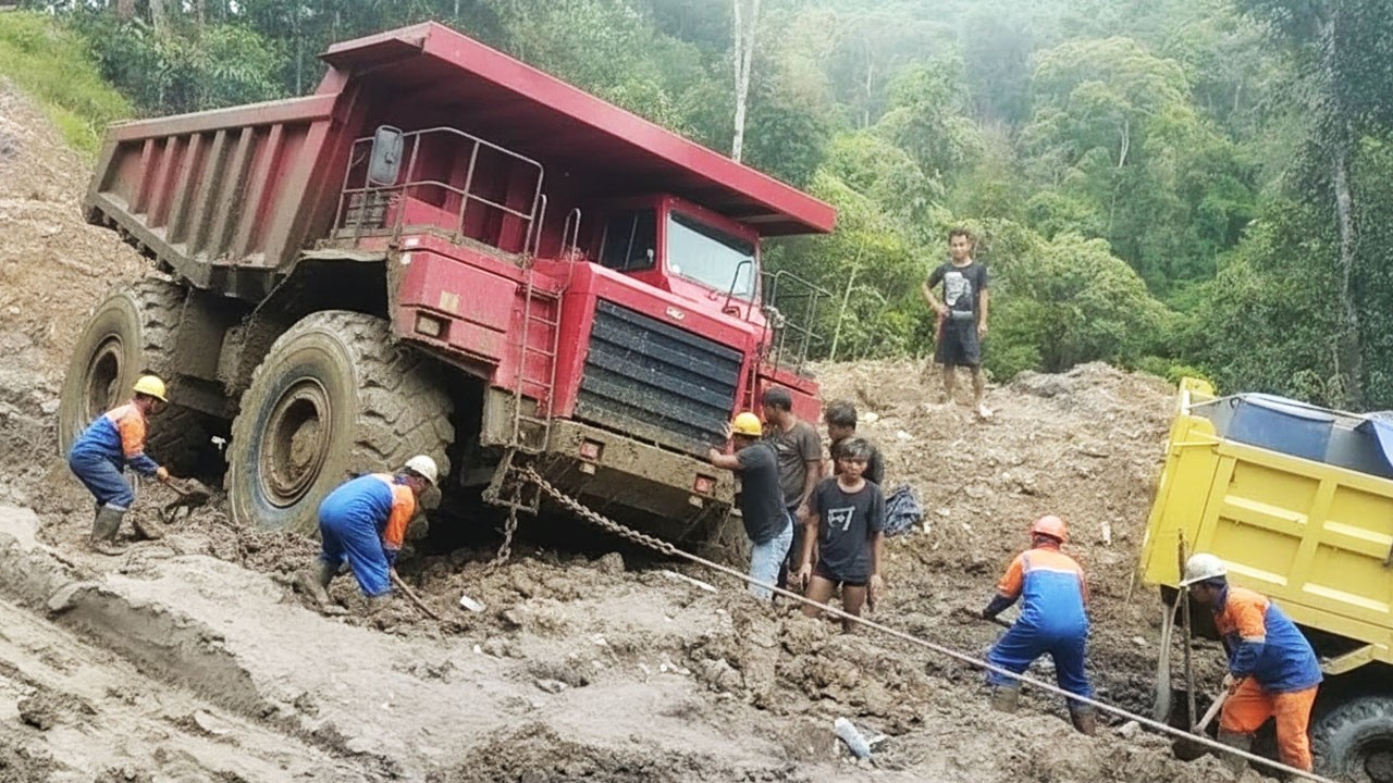 Heavy Equipment Stuck Badly In Soft Ground - Arduous Process Of Rescuing The Heavy Machinery