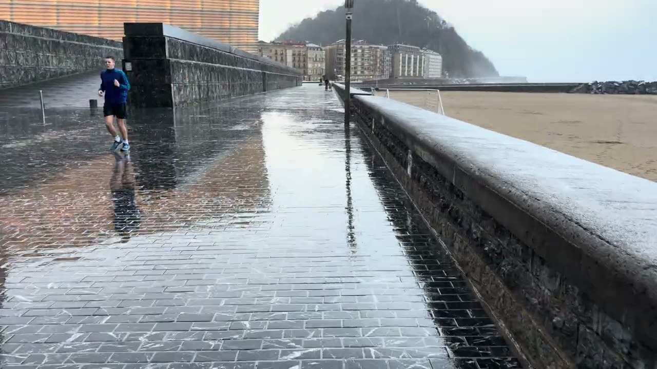 Walking  in the rain San Sebastien Spain 