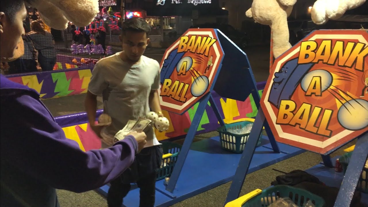 Carnival Game: How The game Bank A Ball scammed my friend! Watch his hands.