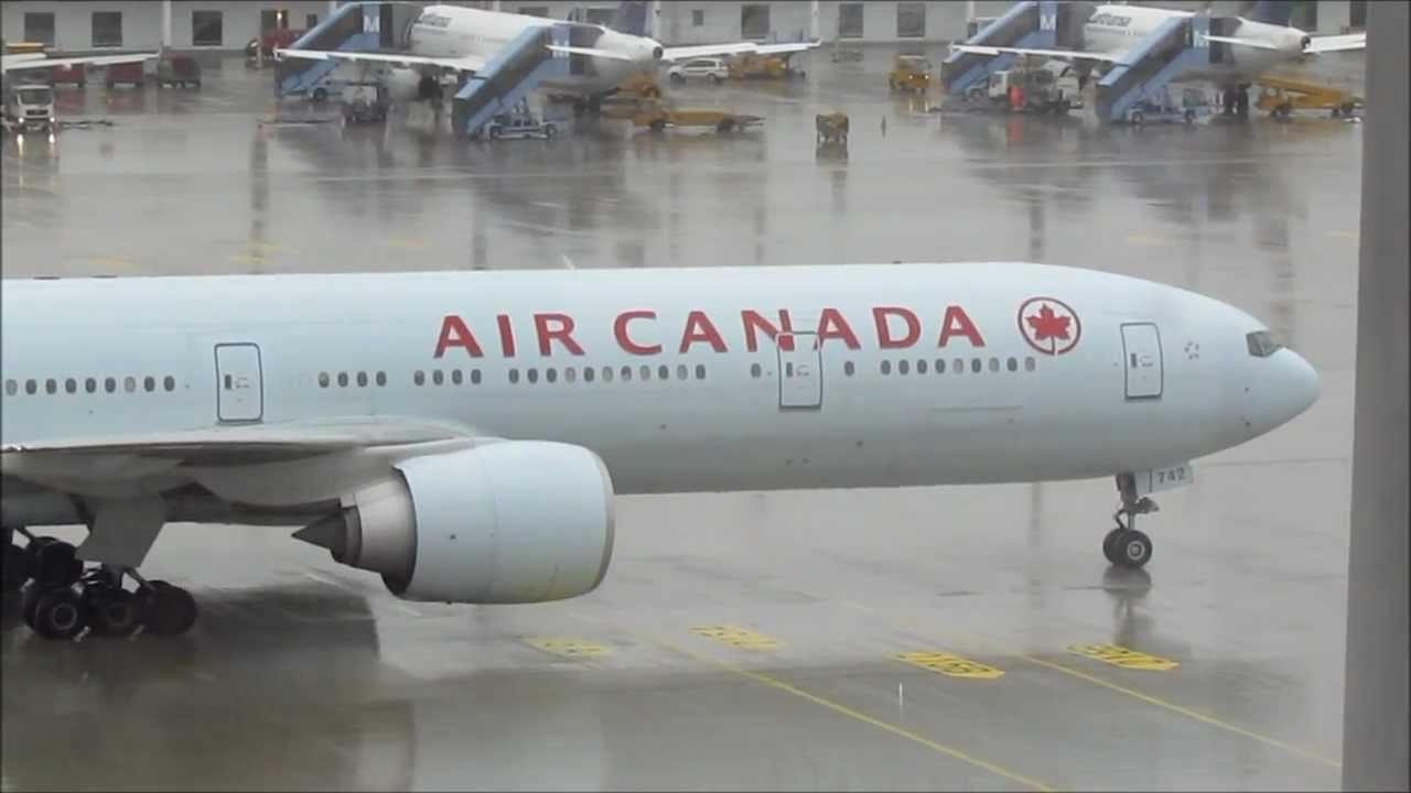 Air Canada Boeing 777-333ER Landing and Taxiing at Munich Airport
