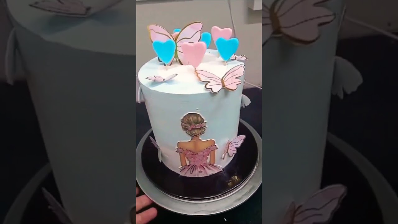 High tech butterfly doll theme cake design 