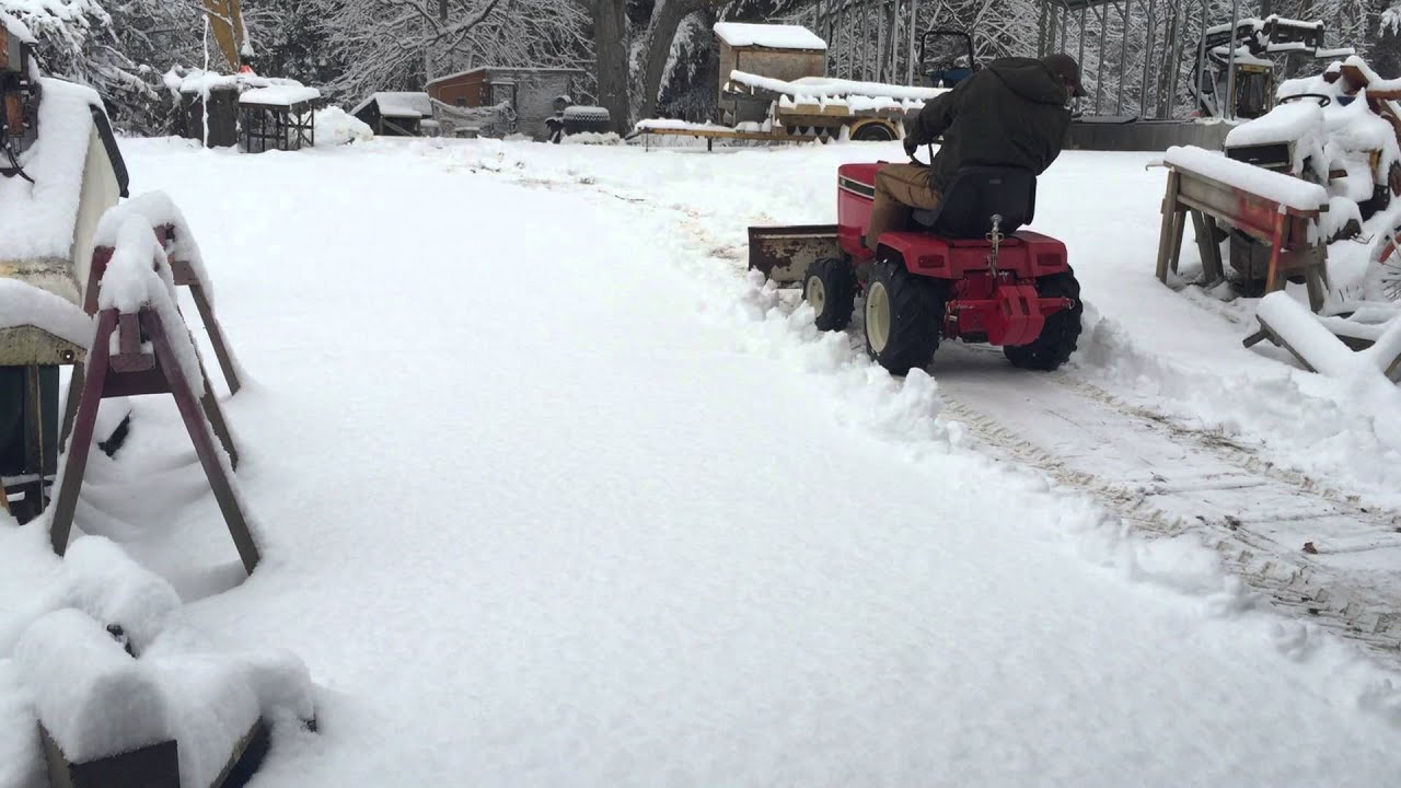 cub cadet 782 plowing snow with 54 inch hydraulic angle plow