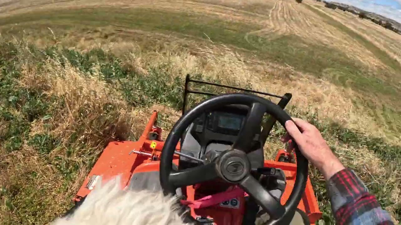 Kubota F3690 mowing on a slope.