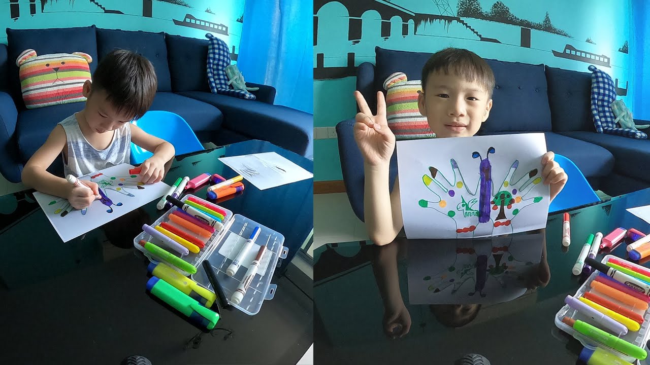 Drawing butterfly with photocopy of hands by Jaydon&Caleb