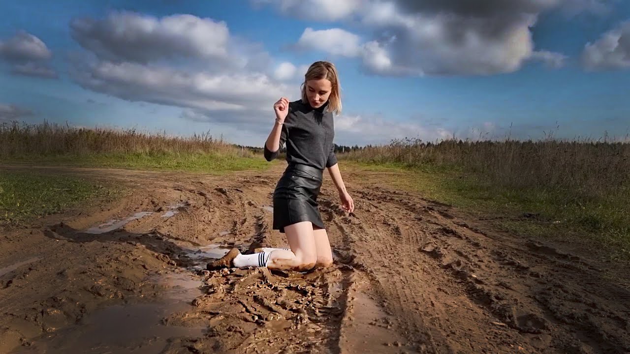 Muddy knee high white socks and black stockings, white socks on muddy field, wet white sock (# 882)