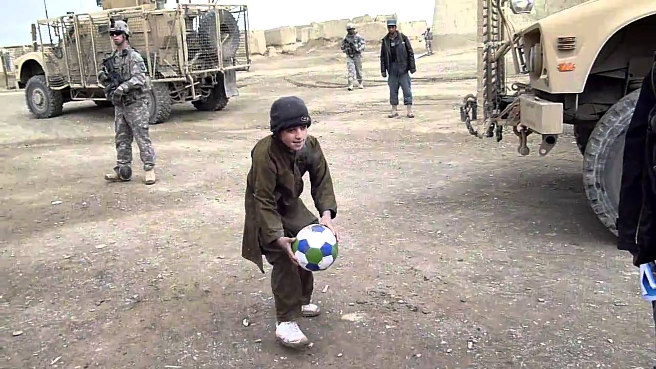 Playing football with Afghan children